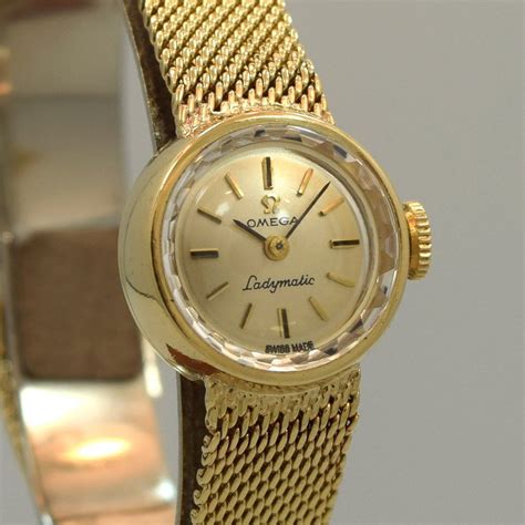 vintage omega ladymatic 14k watch.